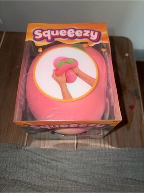 Sunny Days Squeezy Pink Stress Peach Squeeze Toy